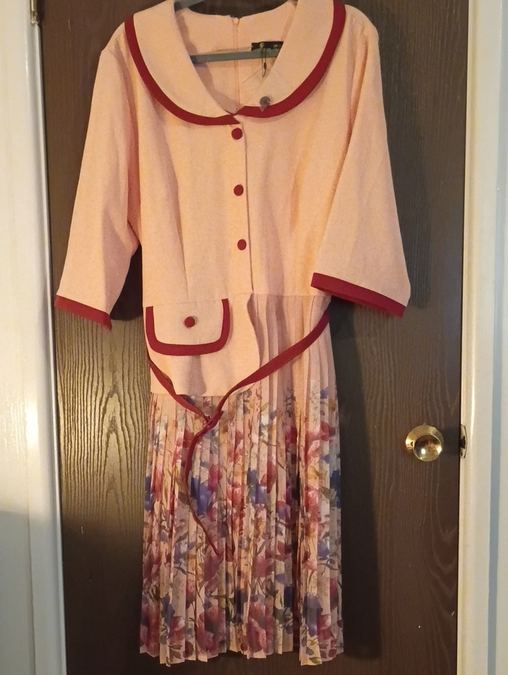 Pink Midi Dress with Red Trim and Floral Pleated Skirt